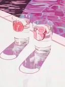 Twee glazen drank met grapefruit bij een roze zwembad