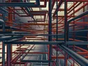 Abstracte 3D-render van een netwerk van rode en blauwe buizen.