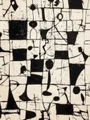 Abstracte zwarte vormen op crème achtergrond