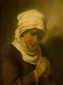 Biddende vrouw van Rembrandt: portret met oude vrouw, witte hoofddoek en gevouwen handen, in warm bruin met wit