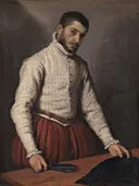 De kleermaker van Giovanni Battista Moroni: portret met man, kleermaker, schaar en tafel, in warm rood en crème