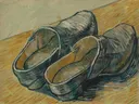 Een paar leren klompen van Vincent van Gogh: stilleven met klompen, hout, schaduw en paar, in geelbruin en grijsblauw