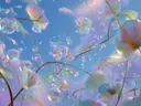Schilderij van glazen bloemblaadjes met druppels tegen een bewolkte hemel