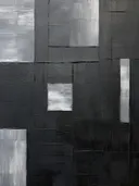 Abstract schilderij met een grafisch blokkenpatroon in grijs en zwart.