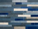 Abstract schilderij met het paletmes in grijsblauw en kobalt