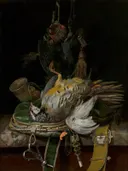 Jachtstilleven van Willem van Aelst: stilleven met jachtbuit, jachthoorn, veren en kleed, in donker met groen en goud