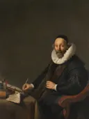 Johannes Wttenbogaert (1557 1644). Remonstrant Minister in The Hague van Jacob Adriaensz Backer: portret met man, molensteenkraag, schrijftafel en boek, in donker bruin