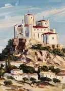Kasteel op een heuveltop boven een Mediterraans dorp