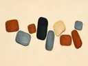 Losse kiezelstenen in de stijl Organic Geometry, in gedempt blauwgrijs, romige crème en terracotta, met een diepzwart accent