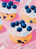 Schilderij van mini cheesecakes met bosbessen.