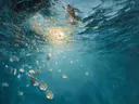 Schilderij van onderwaterlicht met parels en schelpen