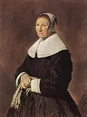 Portret van een onbekende vrouw van Medewerker van Frans Hals (Jan Hals?): portret met vrouw, kanten kraag, muts en zwarte jurk, in zwart met wit