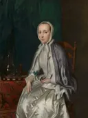 Portret van Elisabeth Troost (1730-1790), echtgenote van Cornelis Ploos van Amstel van George van der Mijn: portret met vrouw, satijnen jurk, muts en stoel, in zilvergrijs met groen