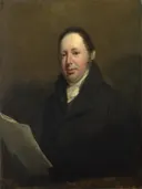 Portret van William Seguier (1772-1843) van John Jackson: portret met man, donkere jas, borstbeeld en zittend, in donkerbruin en olijf