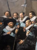 Schutters van wijk XI onder leiding van kapitein Reynier Reael, bekend als ‘De magere compagnie’ van Frans Hals: figuren met schutters, hoeden, kragen en lansen, in zwart met wit en blauw