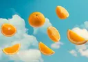 Surrealistische afbeelding van zwevende sinaasappels in de lucht