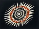 Sterburst-mandala in de stijl Modern Bauhaus, in inktzwart en beenderwit, met één baan vermiljoen