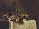 Stilleven met nautilusbeker, 1640 gedateerd van Willem Claesz. Heda: stilleven met tafelkleed, pie en citroen