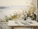 Theeservies op tafel met uitzicht op zee