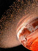 Digitale illustratie van een rood-oranje planeet omgeven door een ring van stofdeeltjes.