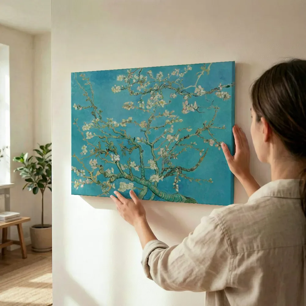 Sfeerimpressie: Amandelbloesem van Vincent van Gogh terwijl het wordt opgehangen