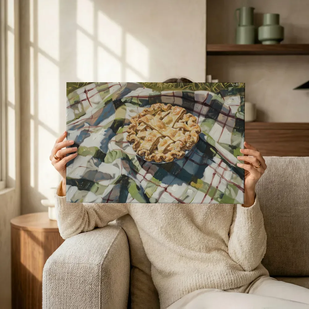 Sfeerimpressie: Appeltaart op picknickkleed terwijl het omhoog wordt gehouden