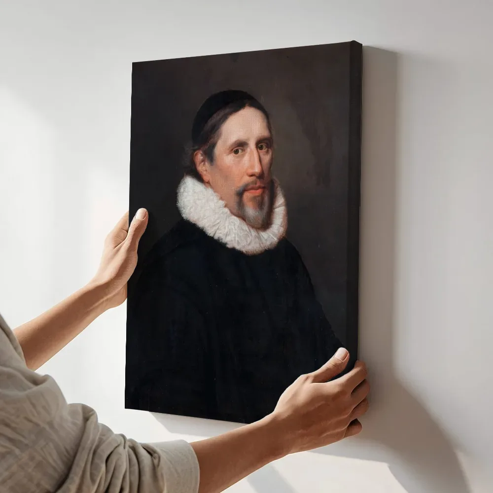 Sfeerimpressie: Arnoldus Geesteranus van Jan Jansz. Westerbaen de Oude terwijl het aan de muur wordt gehangen
