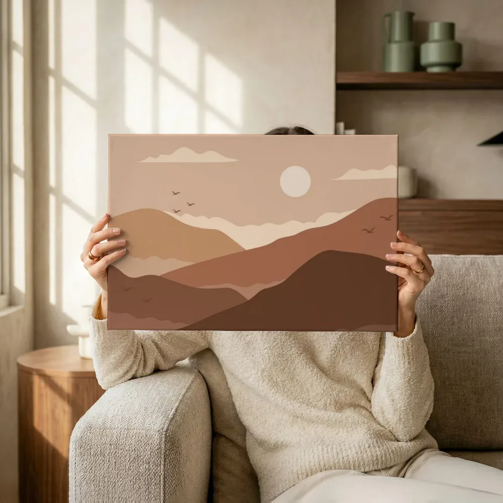 Sfeerimpressie: Berglandschap in warme silhouetten terwijl het omhoog wordt gehouden