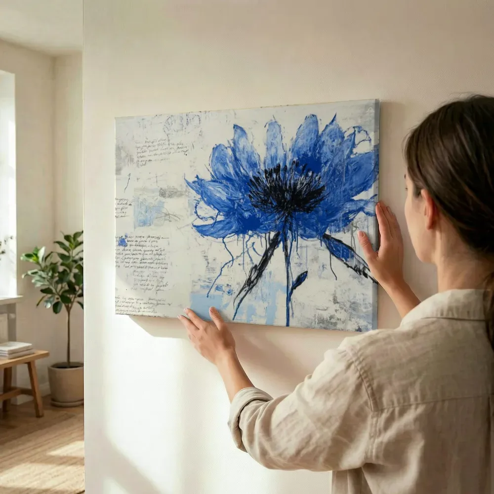 Sfeerimpressie: Blauwe korenbloem met handschrift terwijl het wordt opgehangen