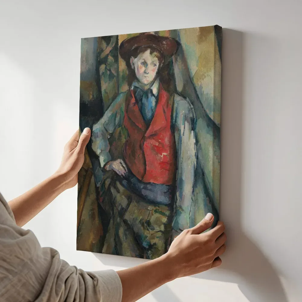 Sfeerimpressie: Jongen in een rood vest van Paul Cezanne terwijl het aan de muur wordt gehangen