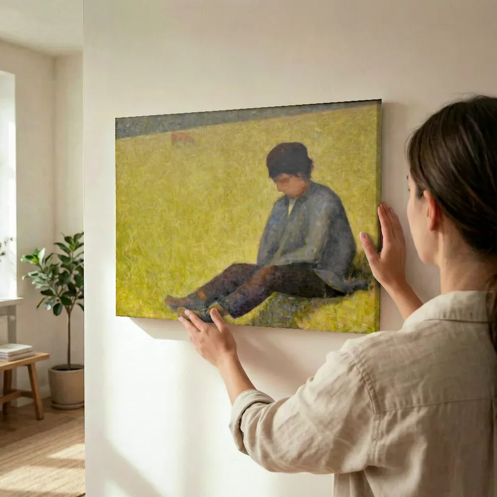 Sfeerimpressie: Jongen zittend in een weiland van Georges Seurat terwijl het wordt opgehangen
