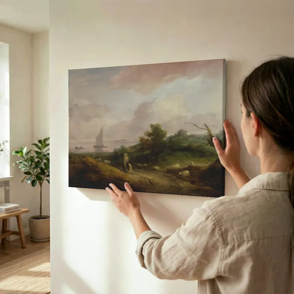 Sfeerimpressie: Kustlandschap met een herder en zijn kudde van Thomas Gainsborough terwijl het wordt opgehangen