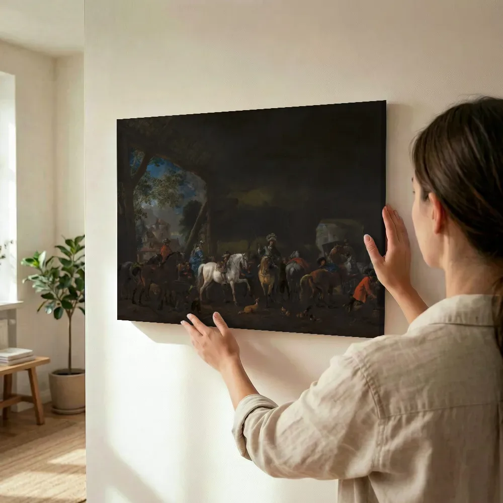 Sfeerimpressie: 'De aankomst in de stal' van Philips Wouwerman terwijl het wordt opgehangen