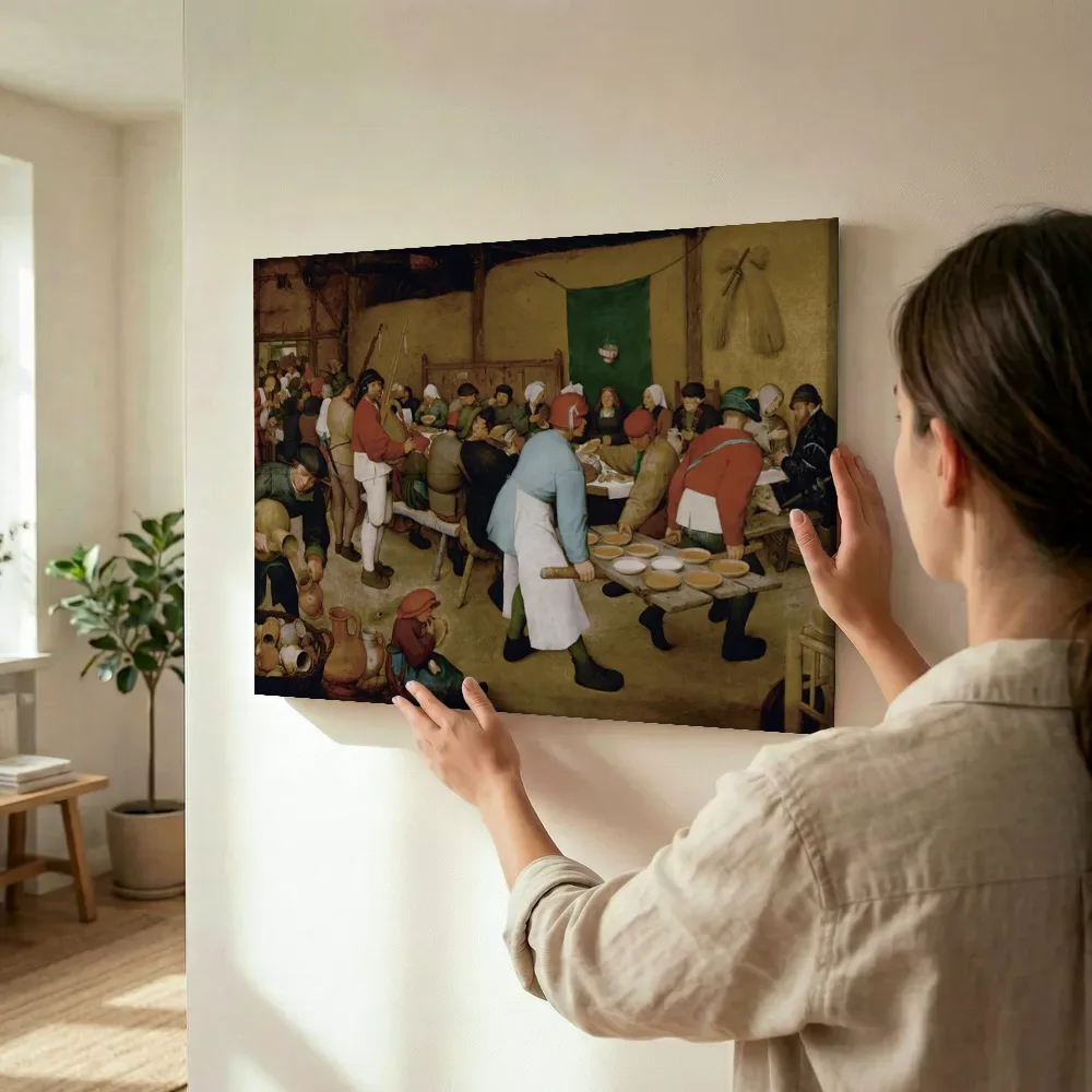 Sfeerimpressie: De Boerenbruiloft van Pieter Bruegel de Oude terwijl het wordt opgehangen