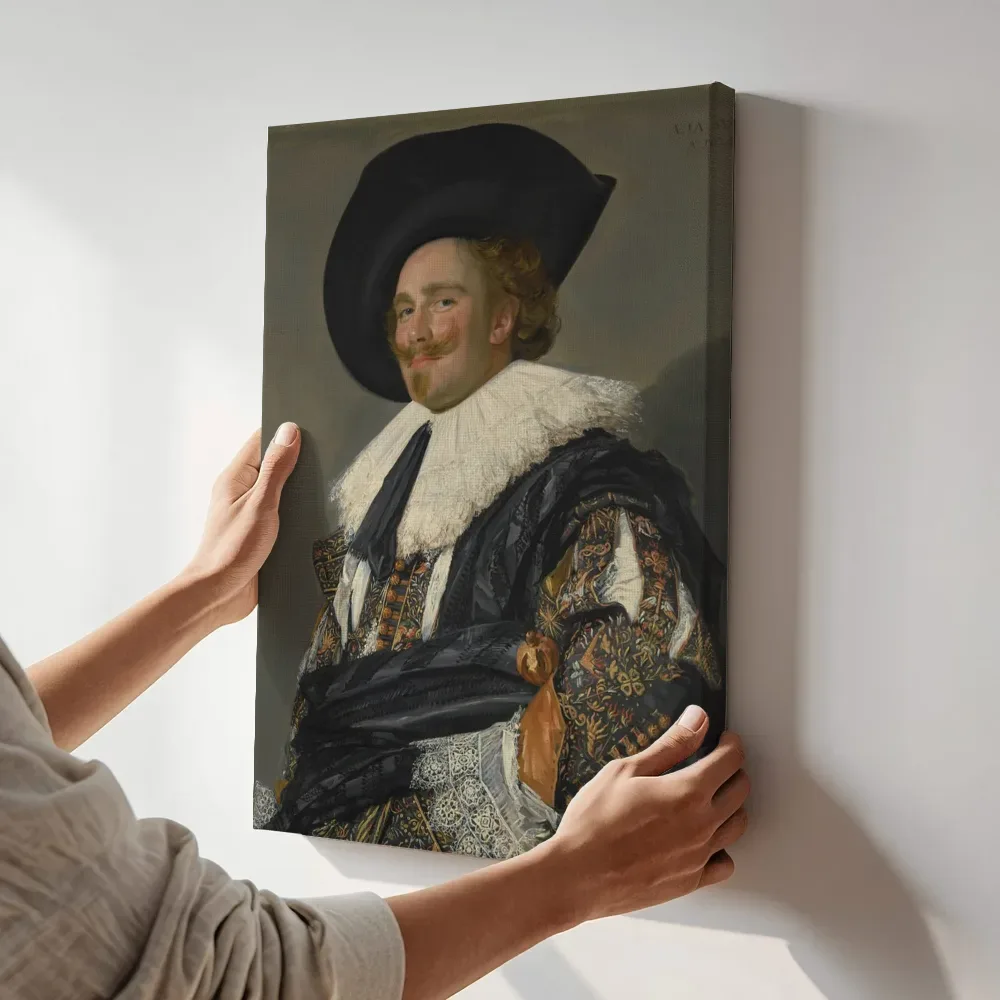 Sfeerimpressie: De lachende cavalier van Frans Hals terwijl het aan de muur wordt gehangen