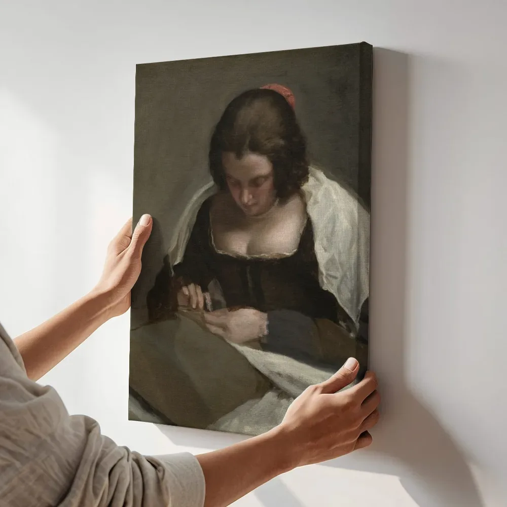 Sfeerimpressie: De naaister van Diego Velázquez terwijl het aan de muur wordt gehangen