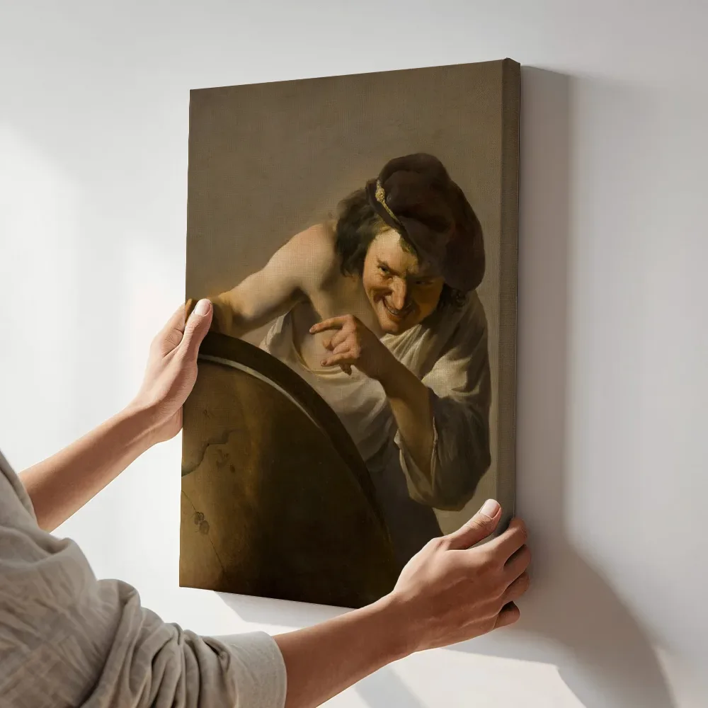 Sfeerimpressie: Democritus, de lachende filosoof van Johannes Moreelse terwijl het aan de muur wordt gehangen