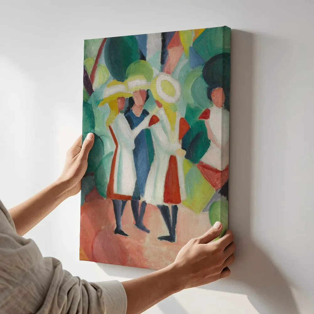 Sfeerimpressie: Drie meisjes met gele strohoeden I van August Macke terwijl het aan de muur wordt gehangen