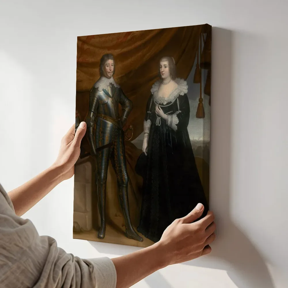 Sfeerimpressie: Dubbelportret van Frederik Hendrik, prins van Oranje (1584-1647) en zijn echtgenote Amalia van Solms-Braunfels (1602-1675) van Gerard van Honthorst terwijl het aan de muur wordt gehangen