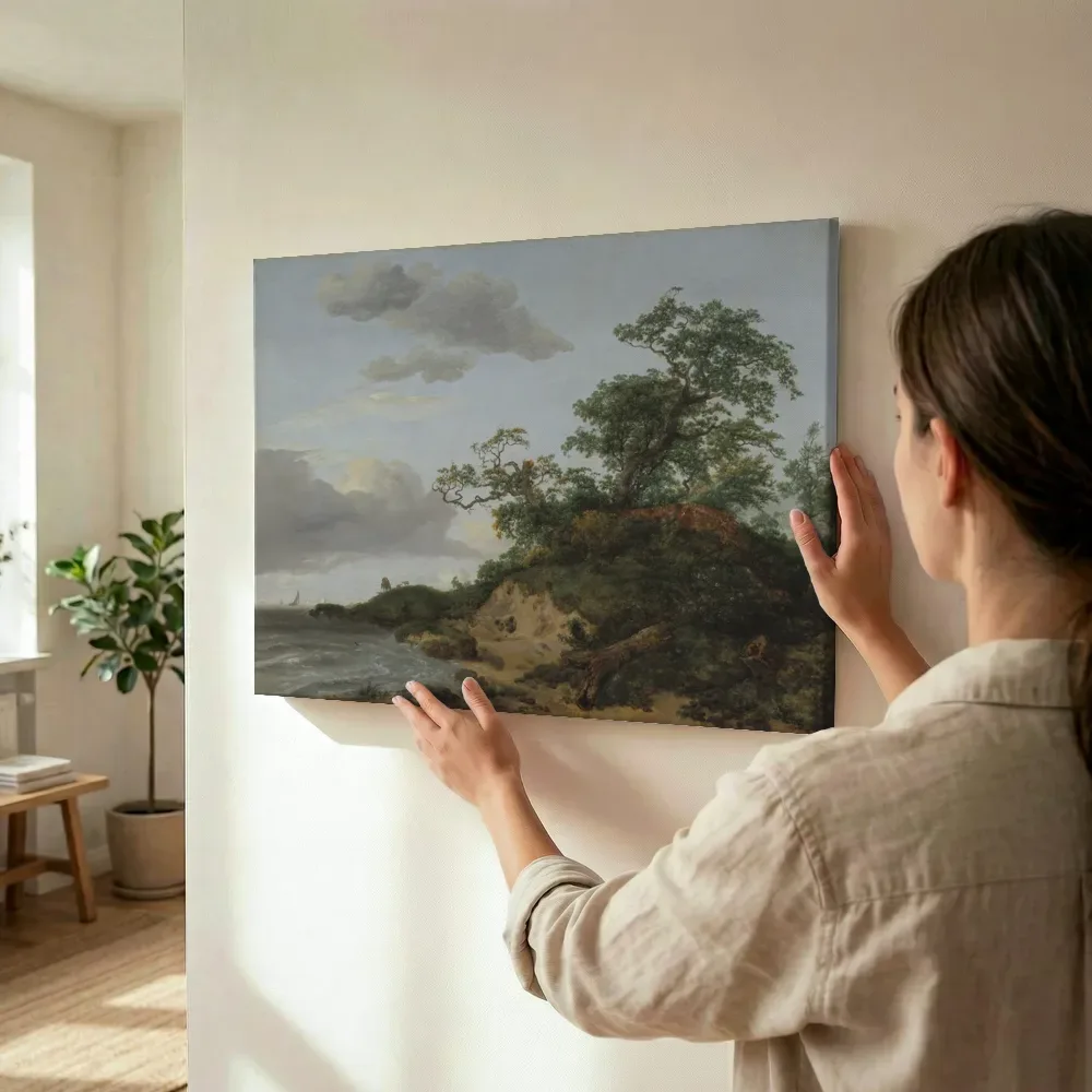 Sfeerimpressie: Duinen aan zee van Jacob van Ruisdael terwijl het wordt opgehangen