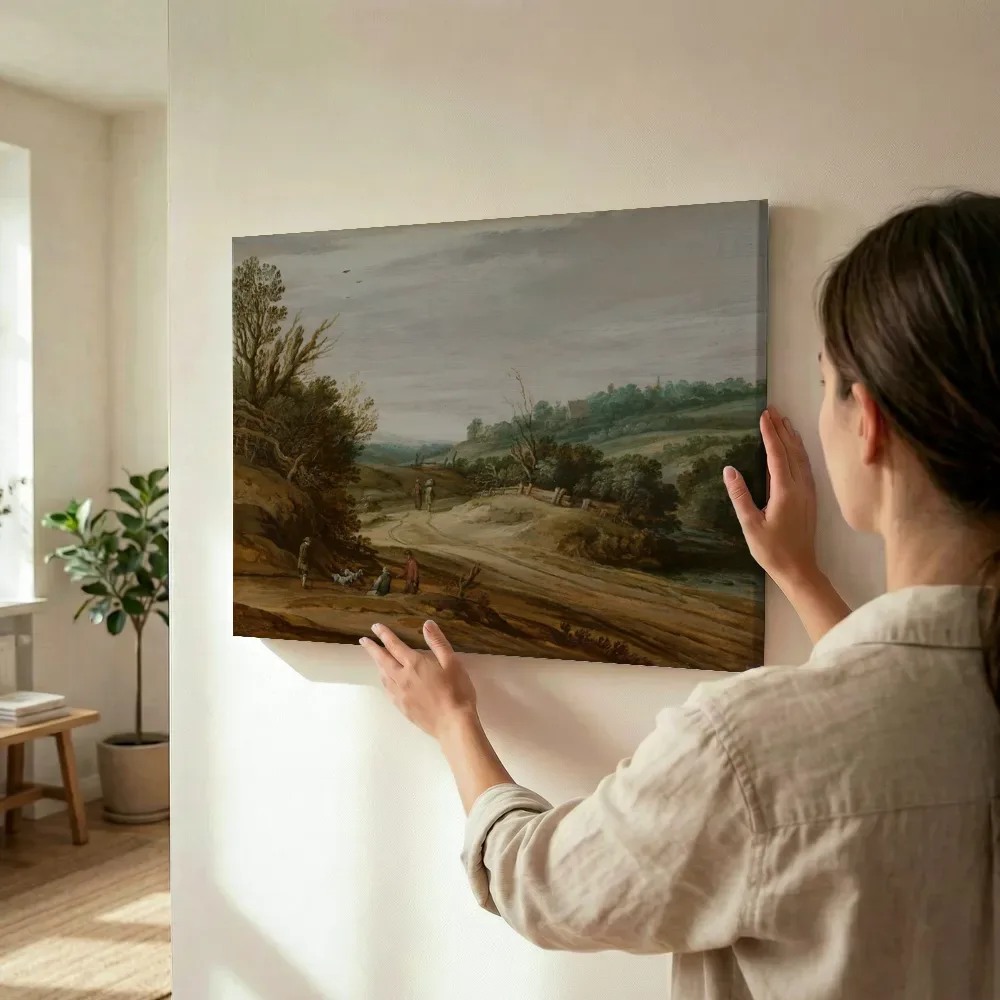 Sfeerimpressie: Duinlandschap met een landweg van Pieter Dircksz Santvoort terwijl het wordt opgehangen