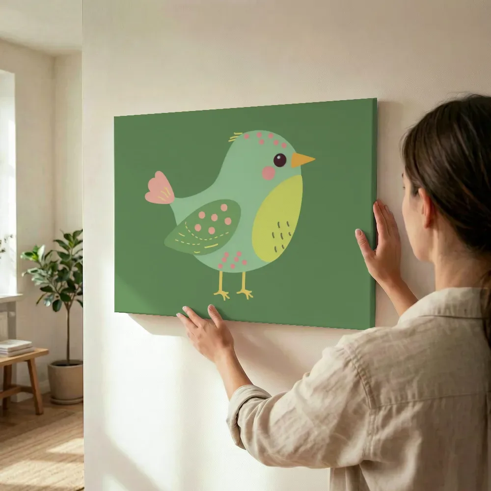 Sfeerimpressie: Groen vogeltje met stippen terwijl het wordt opgehangen