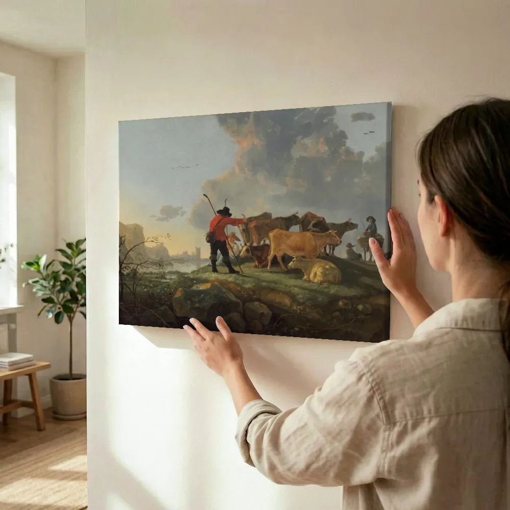 Sfeerimpressie: Herders en vee op de oever van een rivier van Aelbert Cuyp terwijl het wordt opgehangen