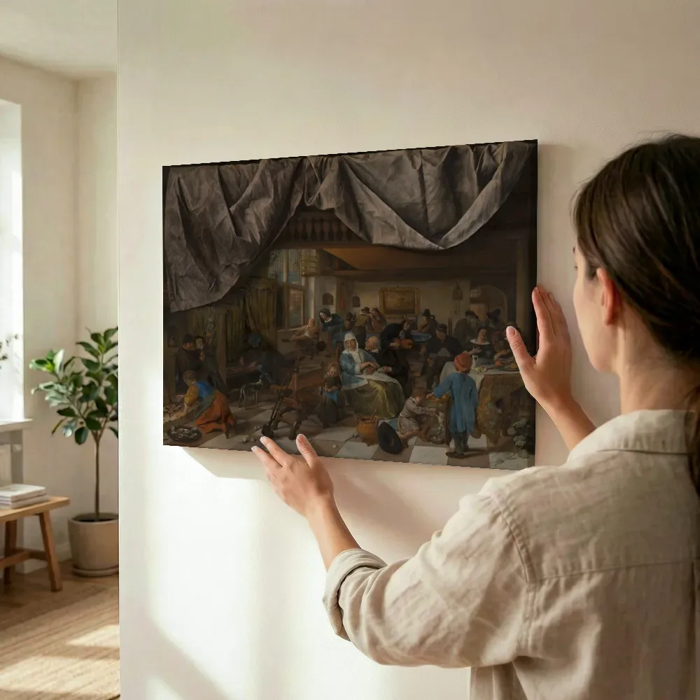 Sfeerimpressie: 'Het toneel van de wereld' van Jan Steen terwijl het wordt opgehangen