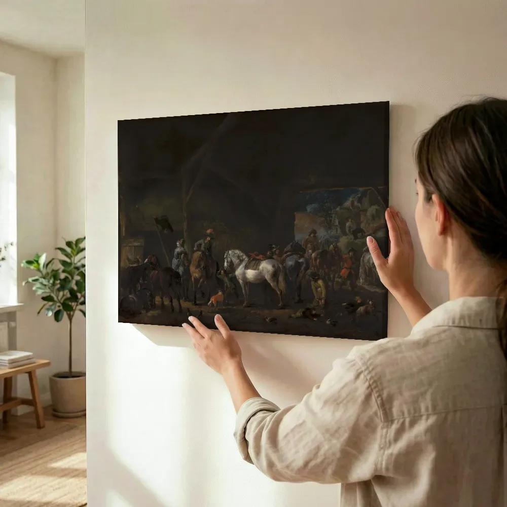 Sfeerimpressie: 'Het vertrek uit de stal' van Philips Wouwerman terwijl het wordt opgehangen