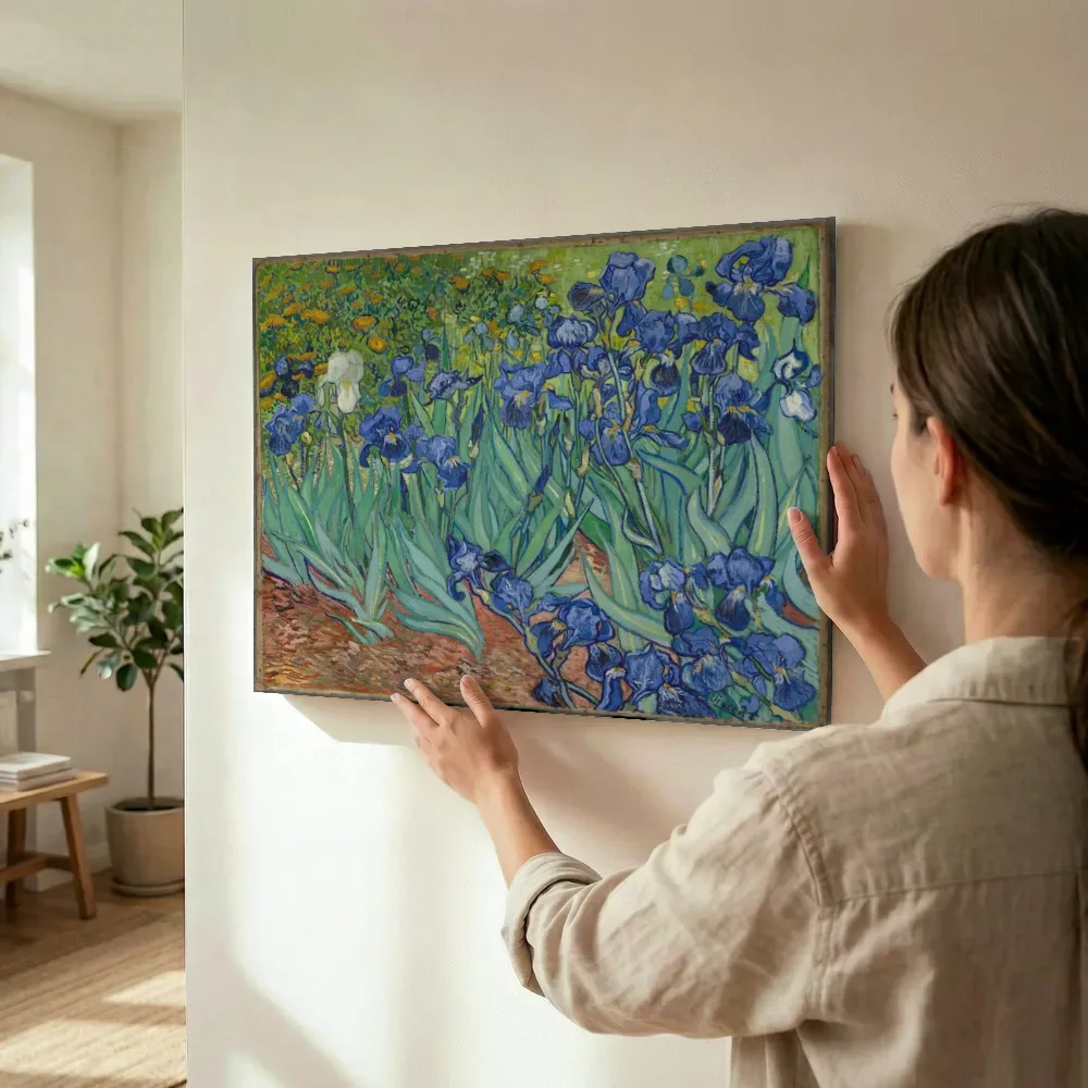 Sfeerimpressie: Irissen van Vincent van Gogh terwijl het wordt opgehangen