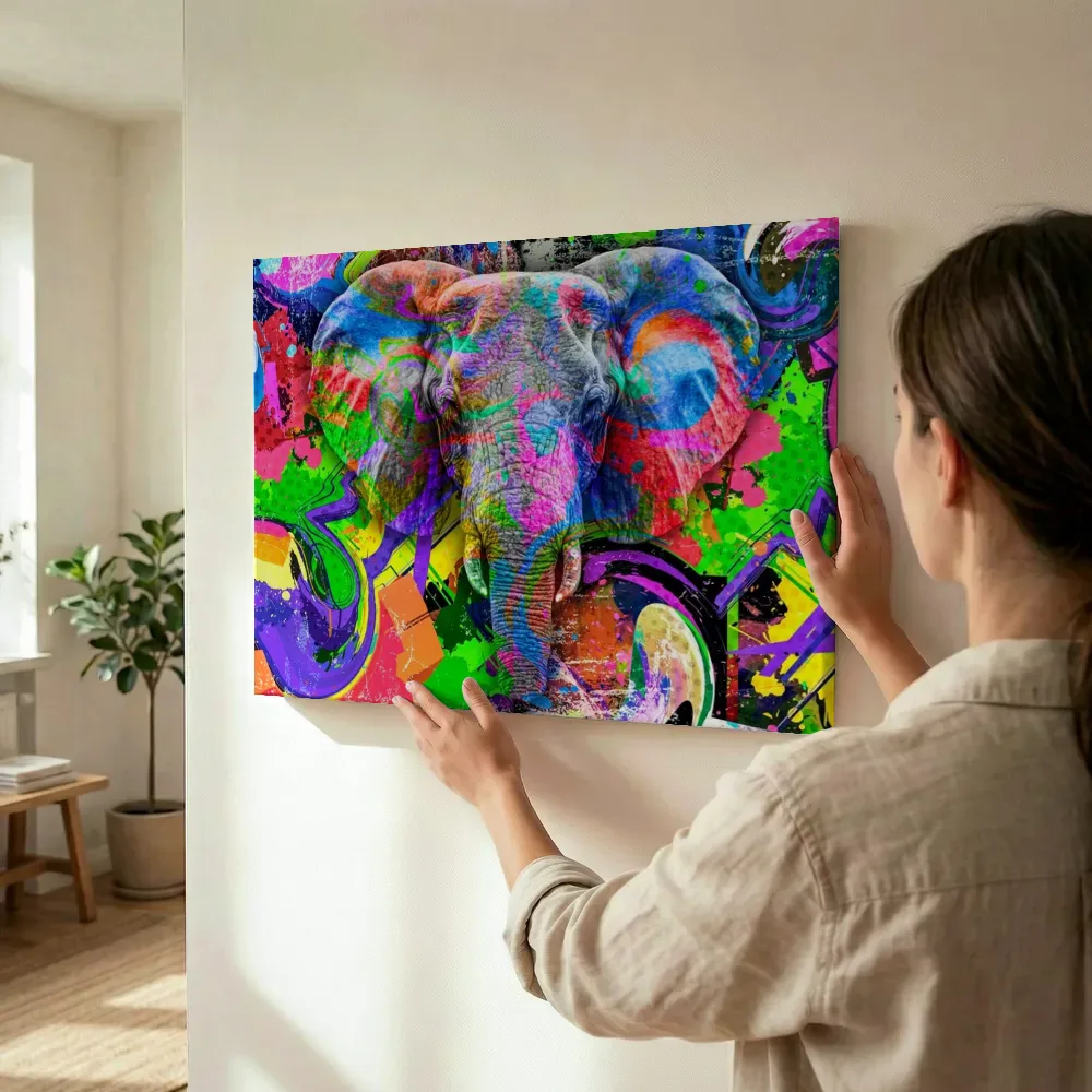 Sfeerimpressie: Kleurrijke olifant popart terwijl het wordt opgehangen