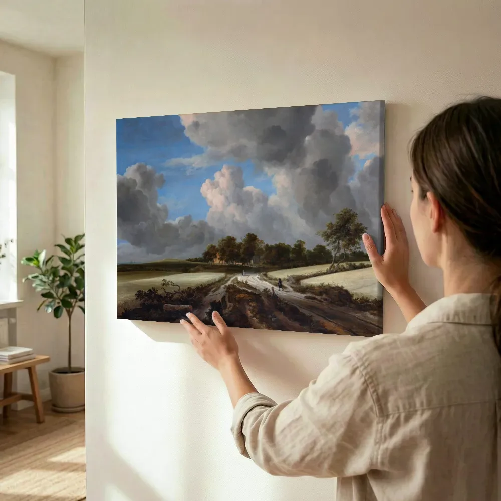Sfeerimpressie: Korenvelden van Jacob van Ruisdael terwijl het wordt opgehangen