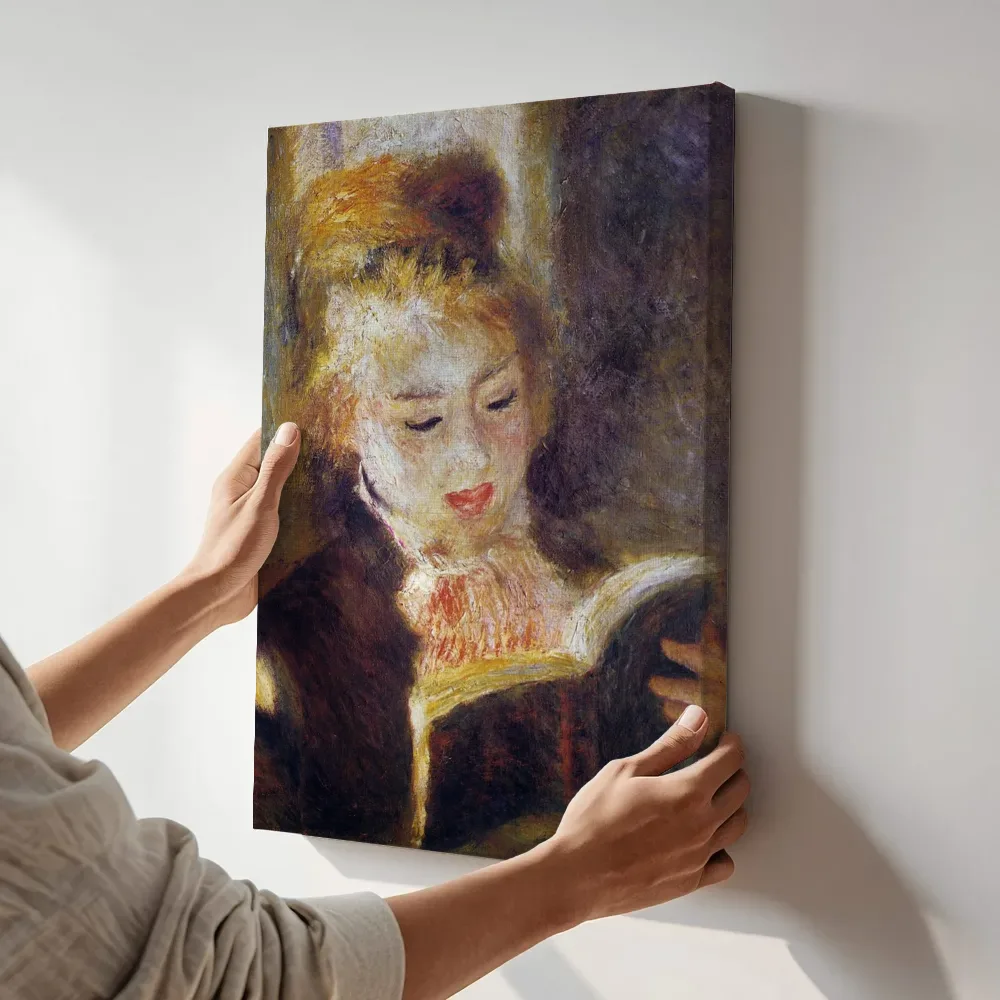 Sfeerimpressie: De lezeres van Pierre-Auguste Renoir terwijl het aan de muur wordt gehangen