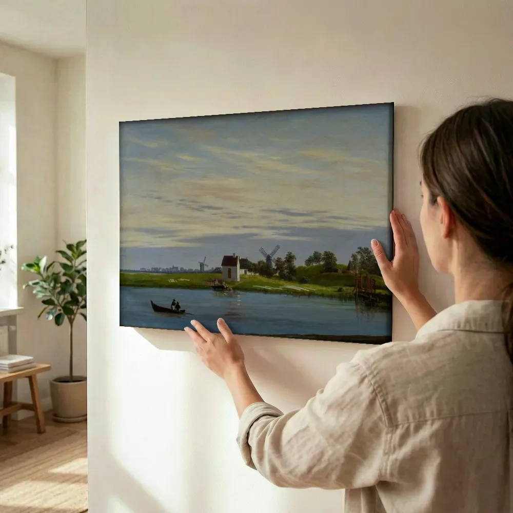 Sfeerimpressie: Landschap met windmolens van Caspar David Friedrich terwijl het wordt opgehangen